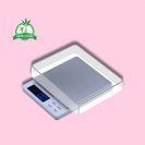 G Scale 2000 g - 0,1 g with pink background and green Grow Island logo in the left corner