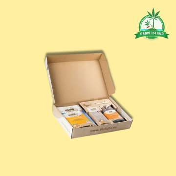 Bio Tabs Starter Box opened with all parts and with yellow background and green Grow Island logo in the right upper corner