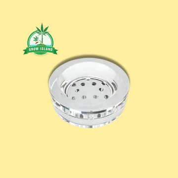 filter pieces to the bong with yellow background and green gros Island logo in the upper right corner